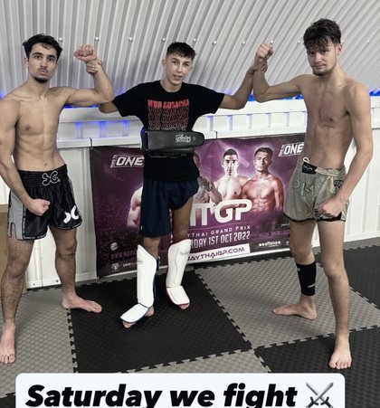 Jayden Gill with two team-mates before a fight night