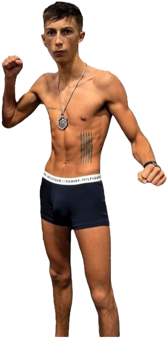 Jayden Gill at the weigh-in, fists raised