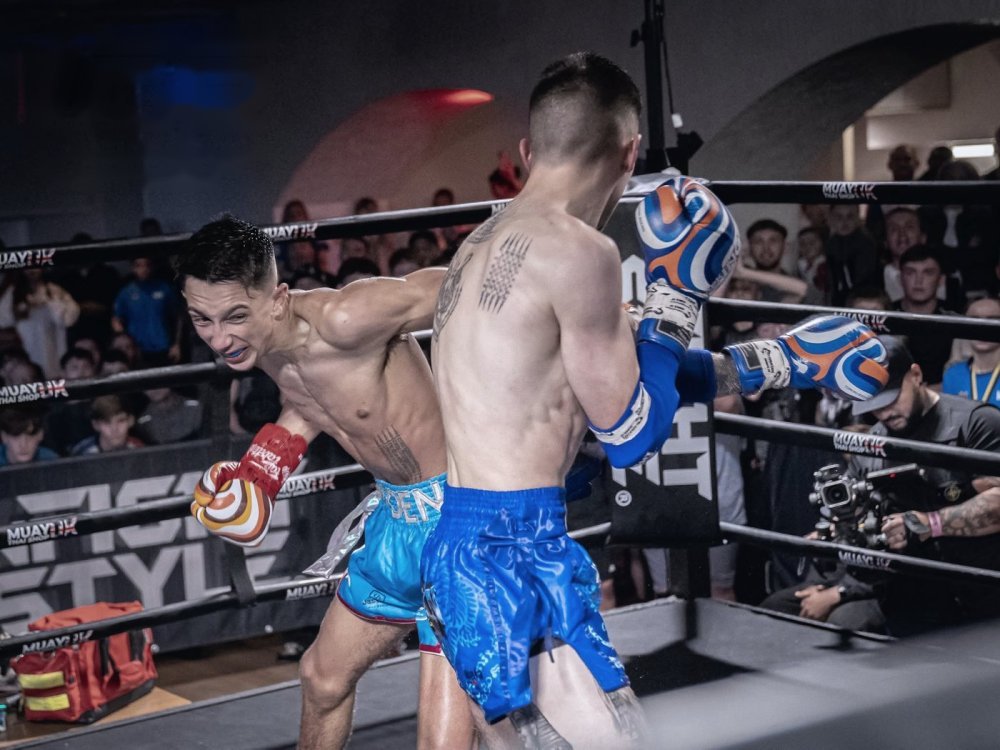 Jayden Gill throwing a punch in the ring at an Isaan Fight Series show